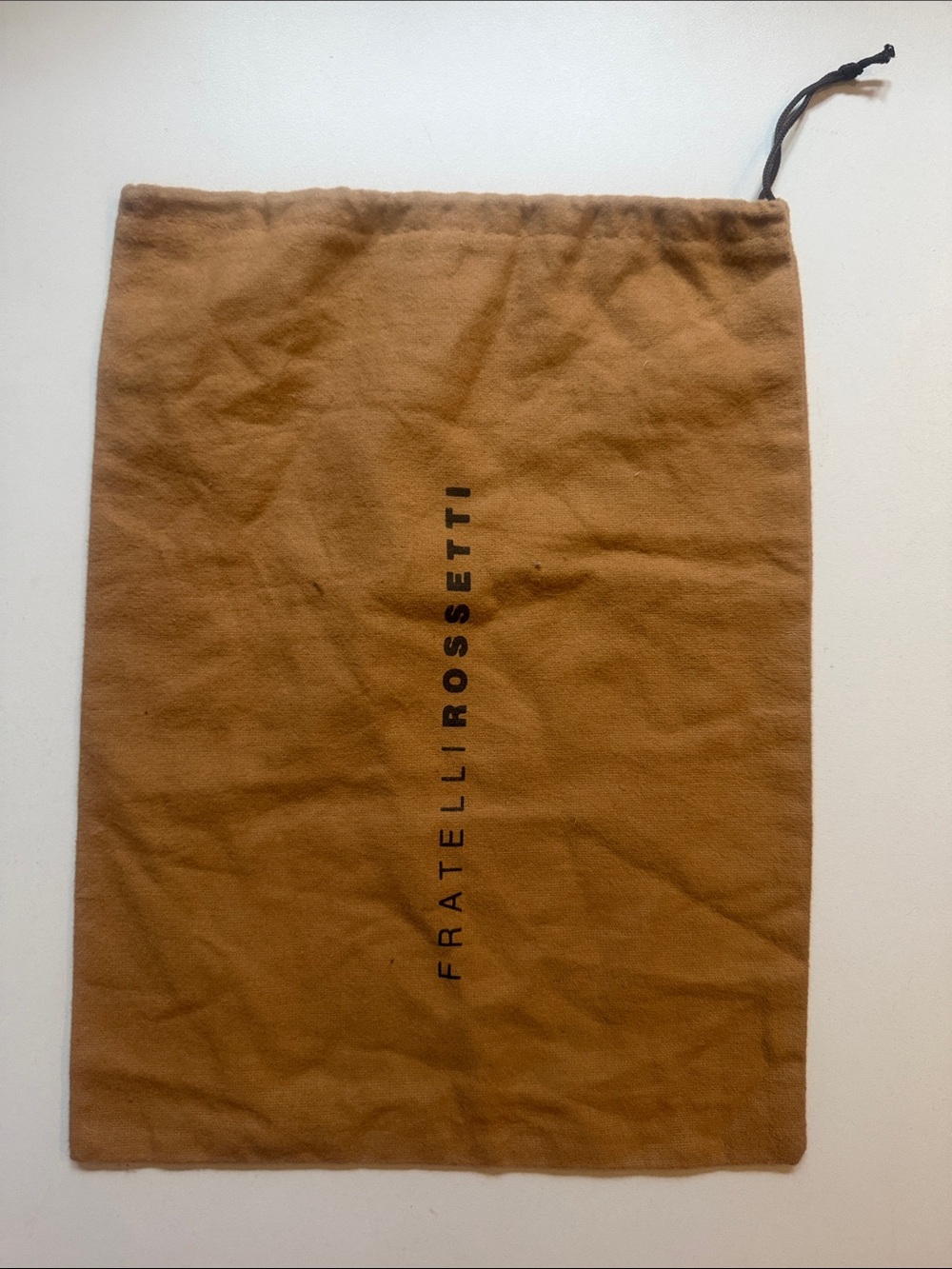 Fratelli Rossetti tan dust bag with black logo drawstring